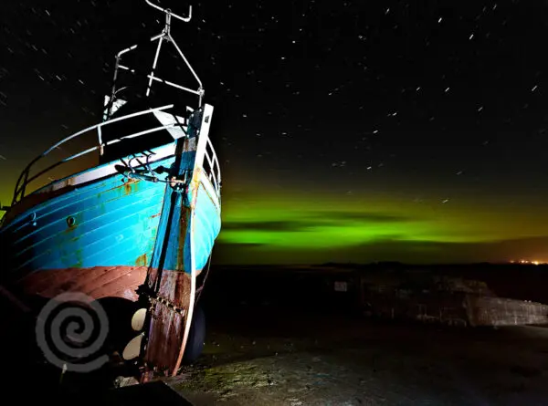 The Northern Lights over Rockstown Pier in Dunaff