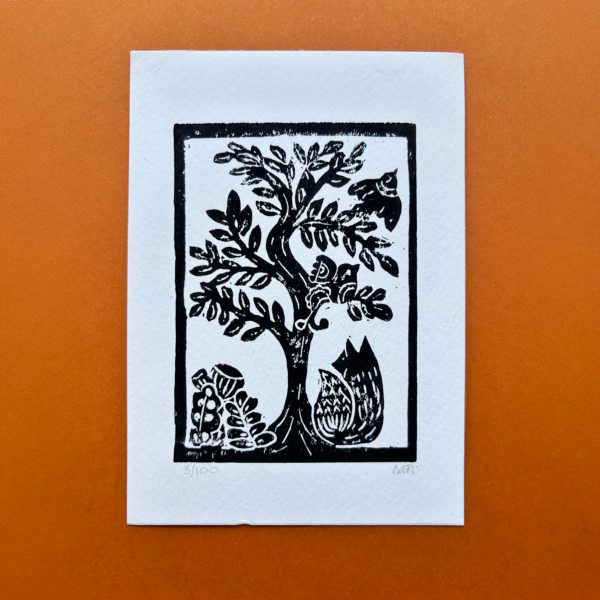 A6 Hand carved and hand pulled original print of a forest scene with a fox and birds in a tree